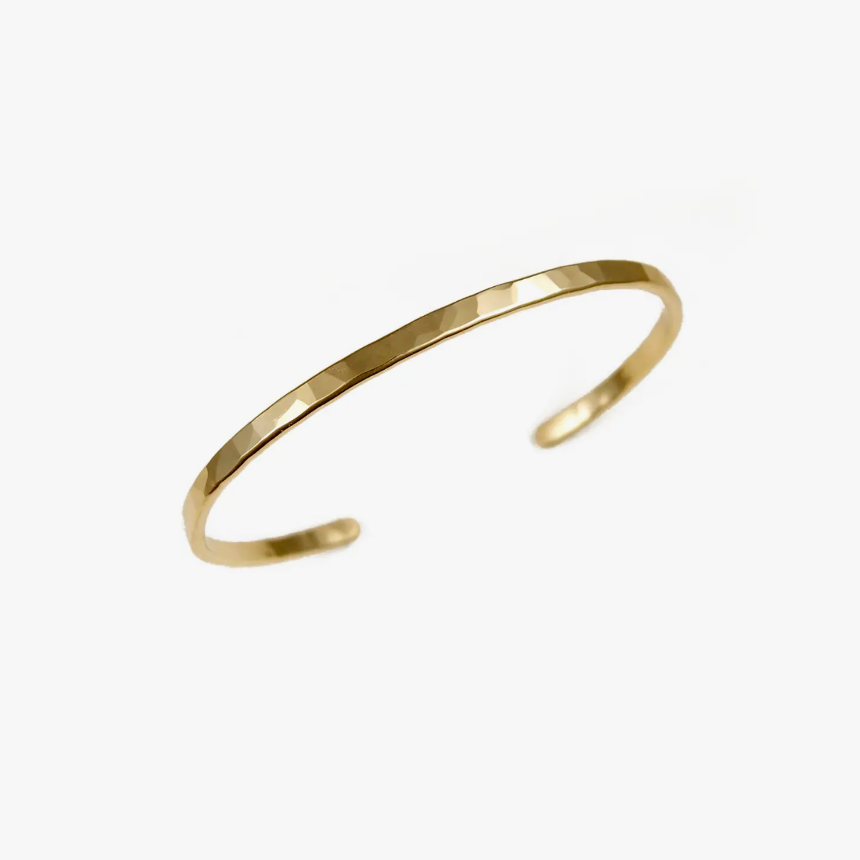 Thin hammered brass cuff bracelet.