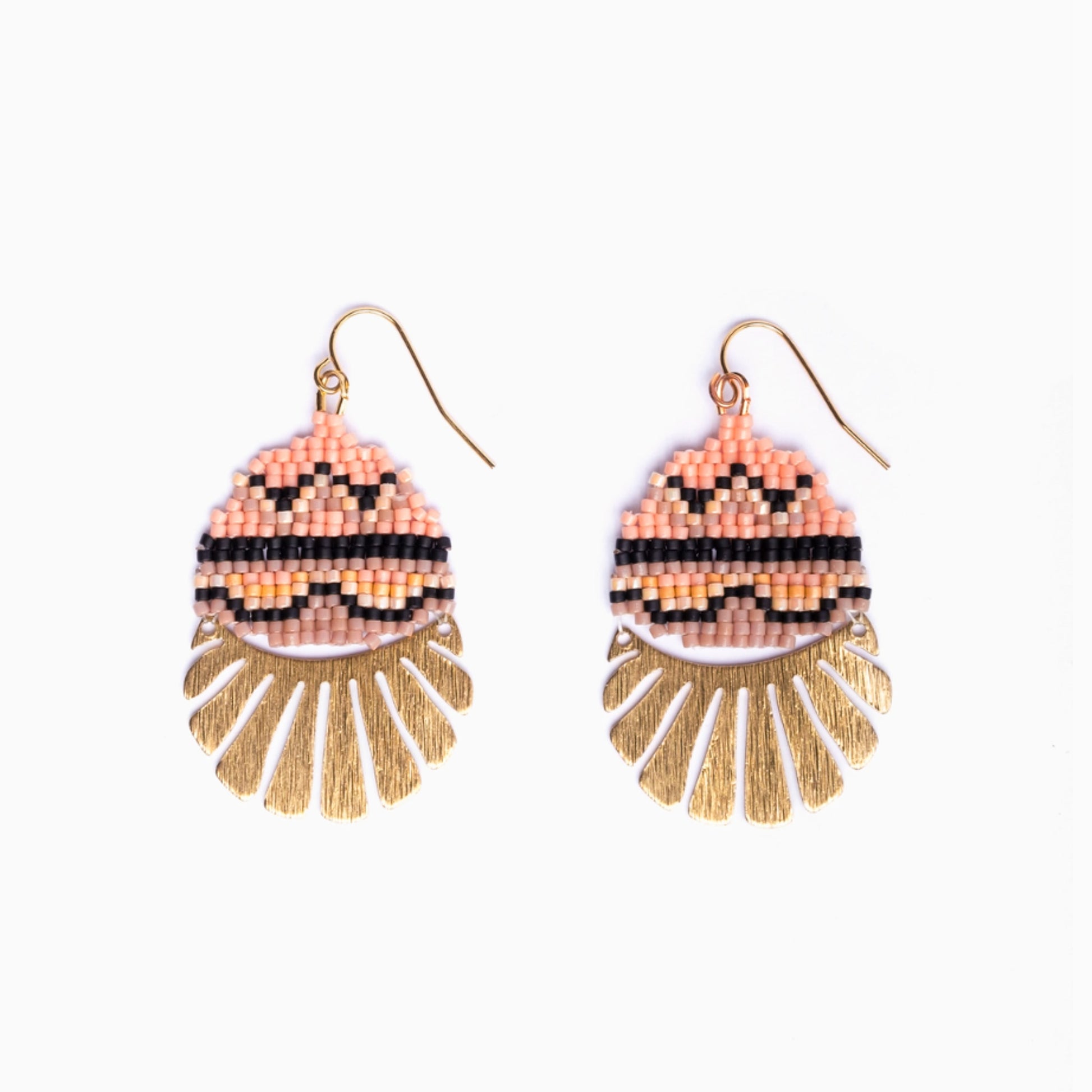 Pair of beaded earrings with gold fringe on a white background