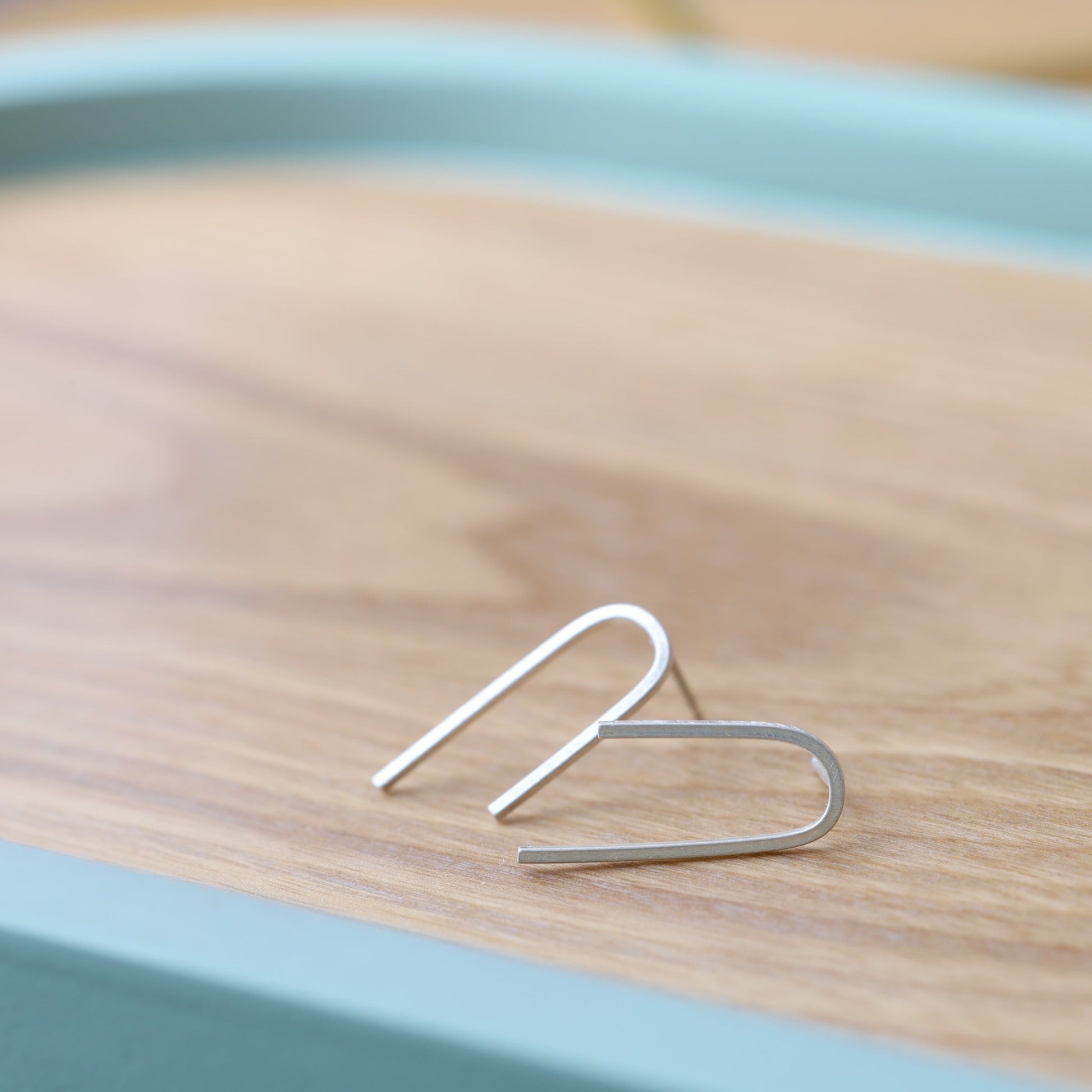Sterling silver arch stud earrings