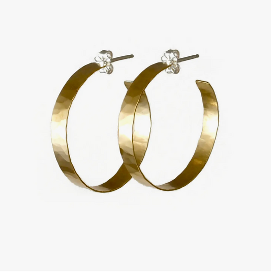 Large thin gold hammered hoops.