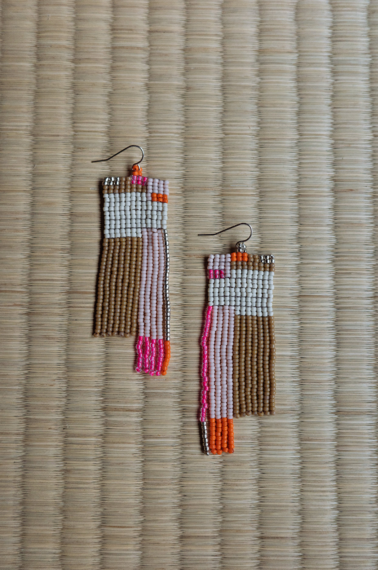 Off-white, pink, orange, brown hand beaded earrings.