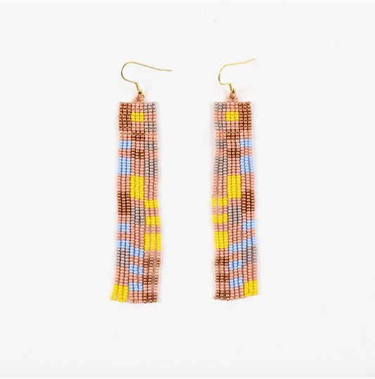Long beaded earrings in yellow, light blue, copper, and pink on a white background.