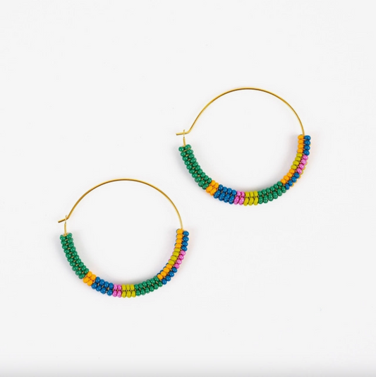 Hoop earrings beaded with green, orange, teal, and yellow beads.