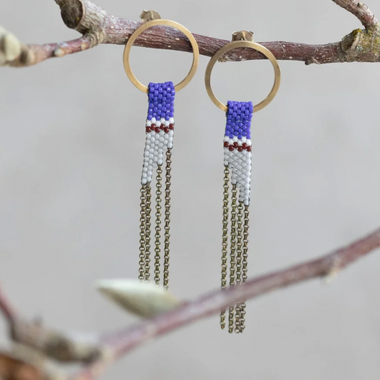 Hand beaded earrings made of gold stud rings wit blue and gray beaded chain.