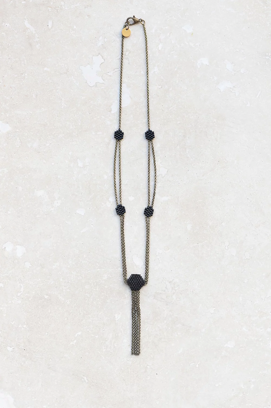 Delicate beaded chain necklaces in black.