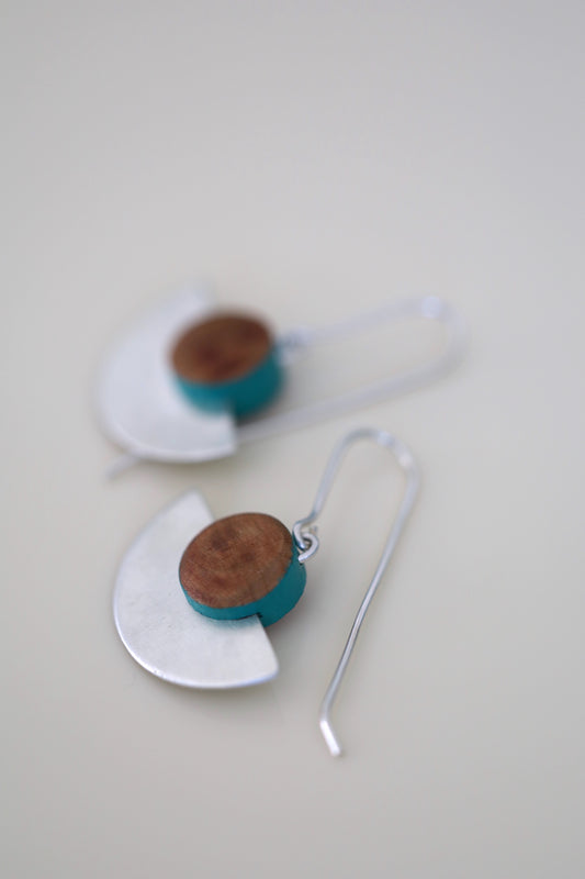 Wood and sterling silver earrings with turquoise painted accents.