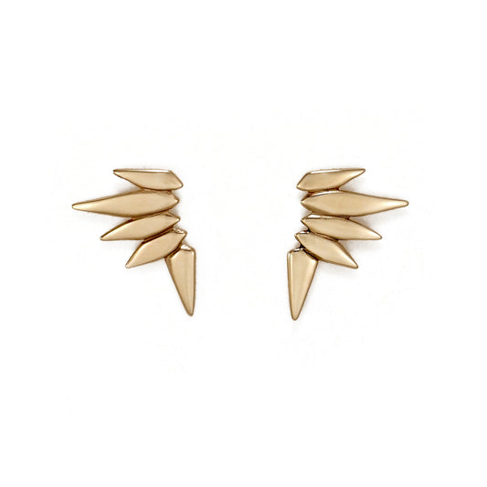 Spiky stud earrings in brass.