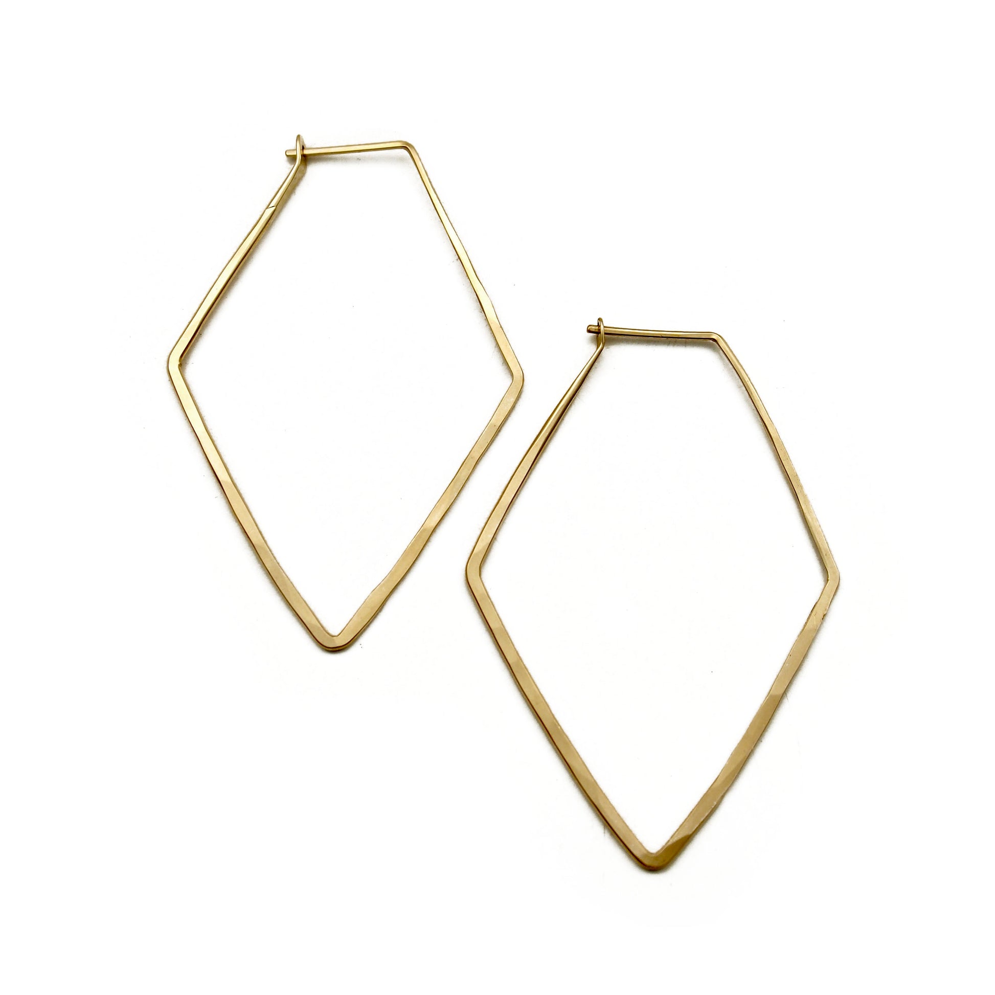 Diamond shaped hoop earrings in gold.